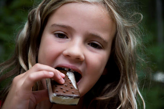girl-eating-ice-cream-bar